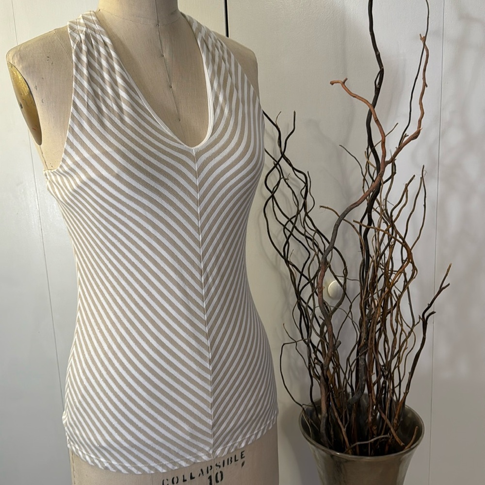 White House Black Market sleeveless stripe blouse in cream and tan